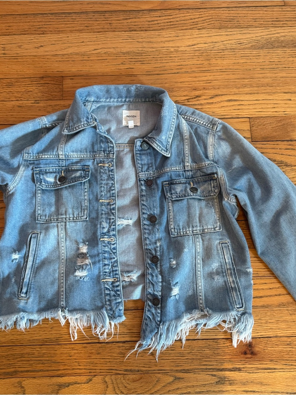 Ragged Hem Light Blue Distressed Denim Jacket by Hidden